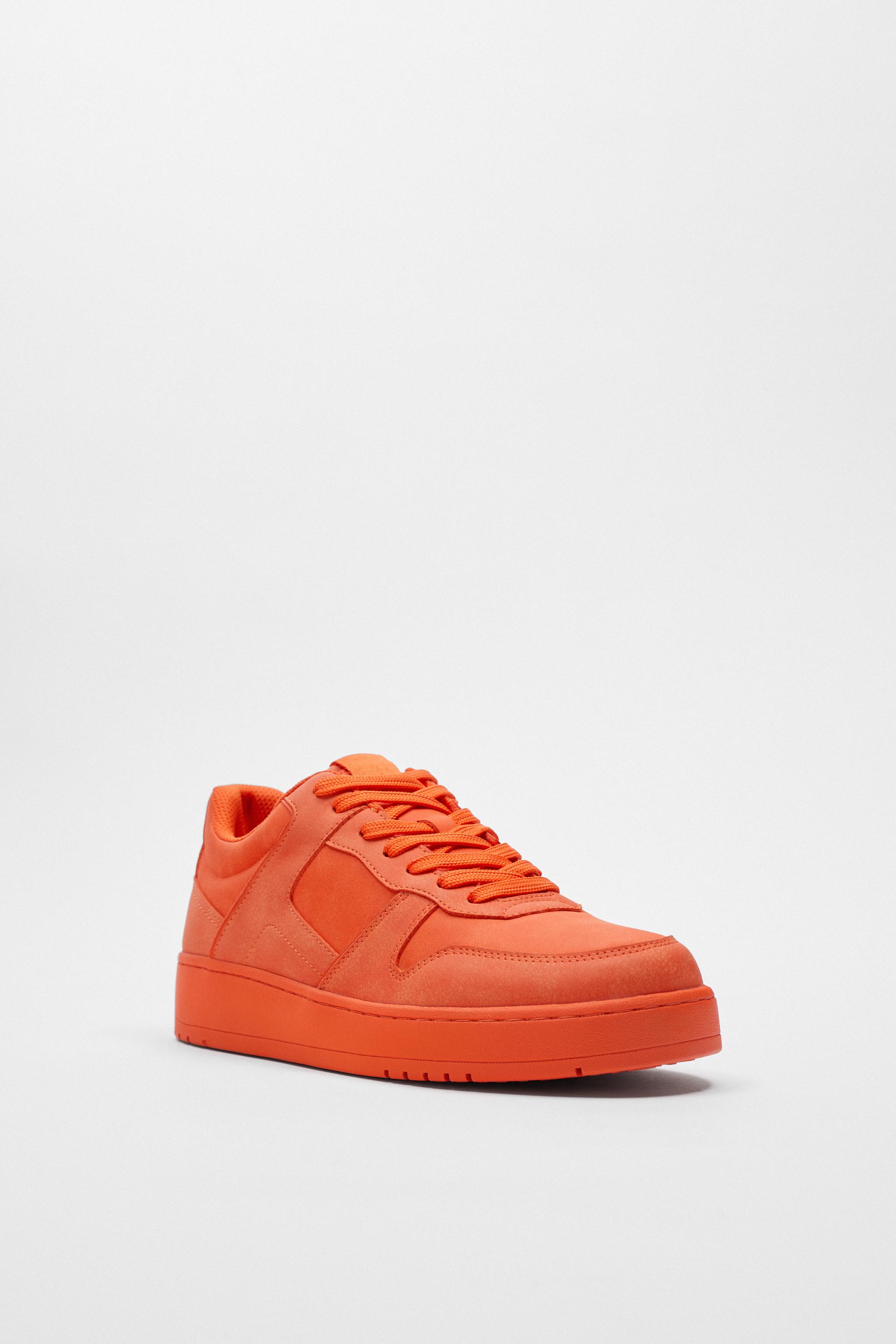 Orange and white sneakers clearance